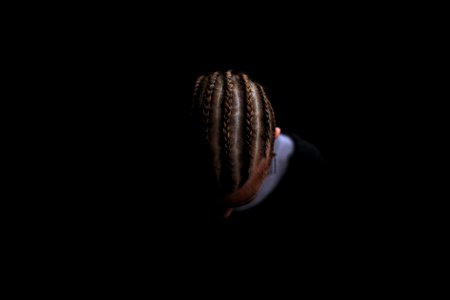 person showing braided hair photo