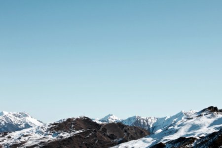 photo of mountain covered by snow during daytime