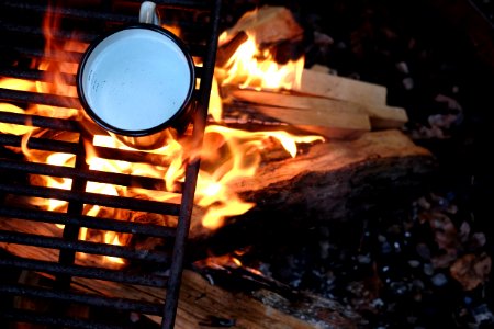 ceramic mug on grill photo