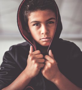 boy in black hoodie photo