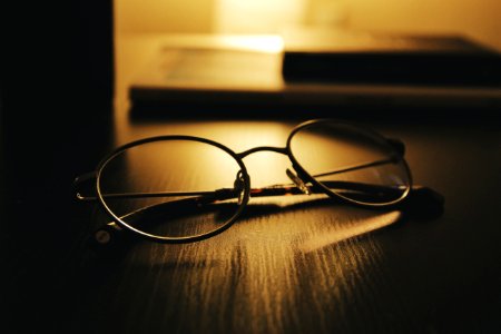 shallow focus of round eyeglasses photo