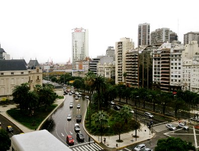 aerial photography of buildings and vehicles on road