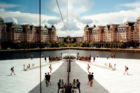 people gathering outside building photo