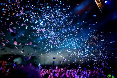 people partying with confetti photo