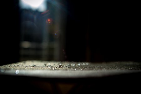 Macro shot of water droplets on a rough surface