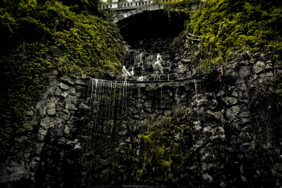 gray concrete bridge over river