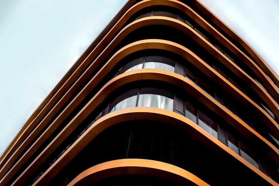 worm's eye view of brown glass building photo