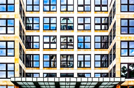 white and black glass walled building