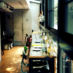 green metal bar stools on bar photo