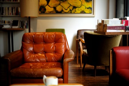 tufted brown leather armchair photo