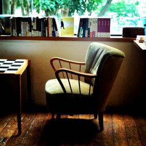 gray armchair near window