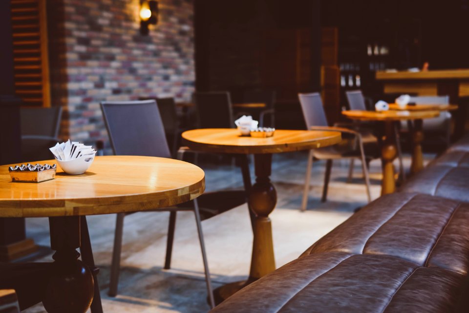 photography of brown pedestal table