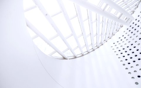white spiral staircase with white railings photo