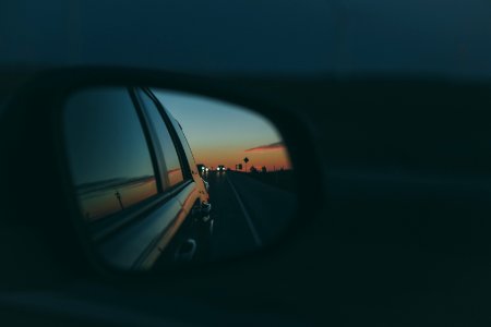 shallow focus photo of car side mirror photo