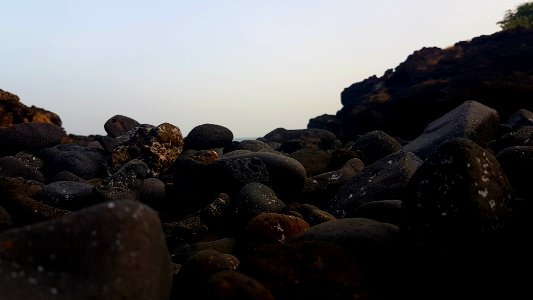 brown stone formation under cloudy sky photo