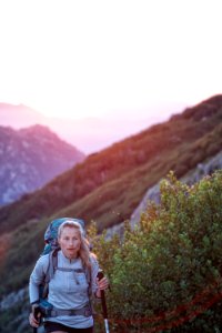 woman hiking on mountain photo