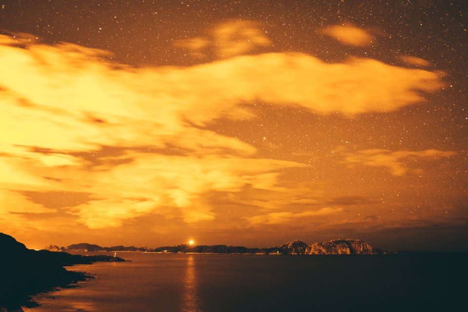 island under orange sky]