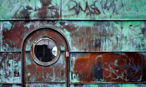 closed brown metal door