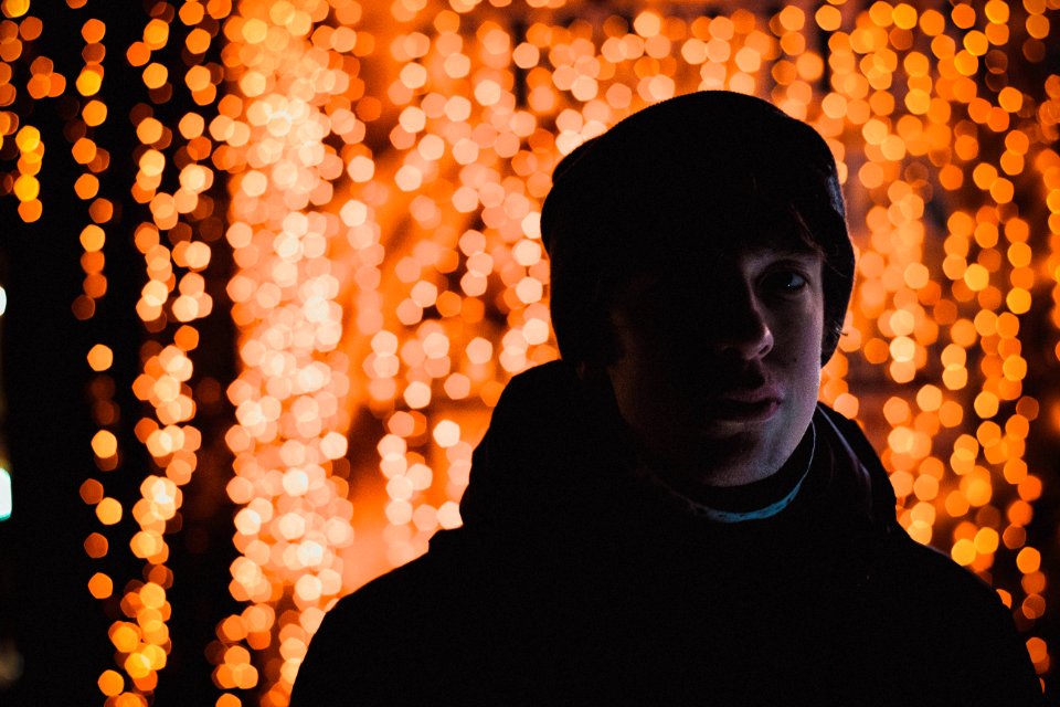 man in winter suit with light background