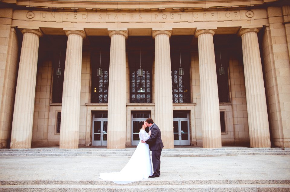 man kissing woman