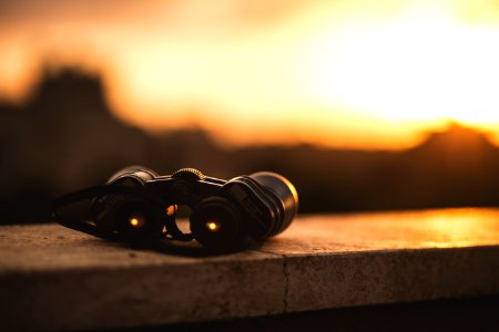 close-up selective focus photo of black binoculars photo