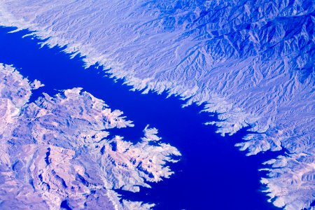 aerial photo of body of water in between mountains photo