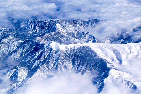 aerial view of snow covered mountains photo