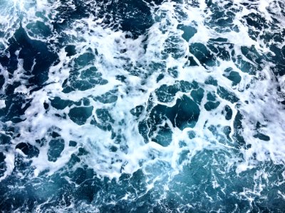 aerial photography of sea foam during daytime photo