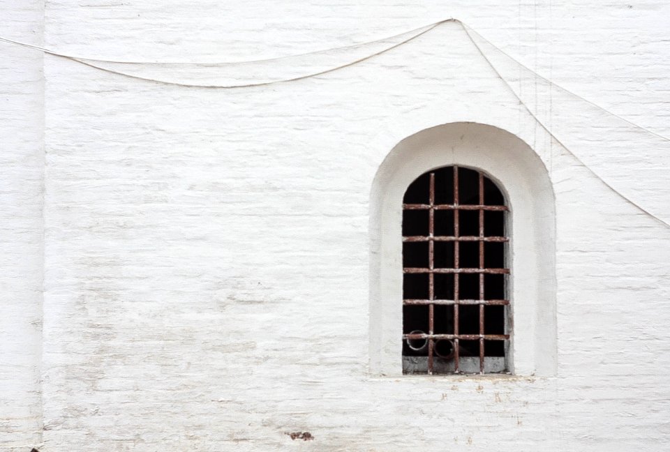 closeup photo of metal window