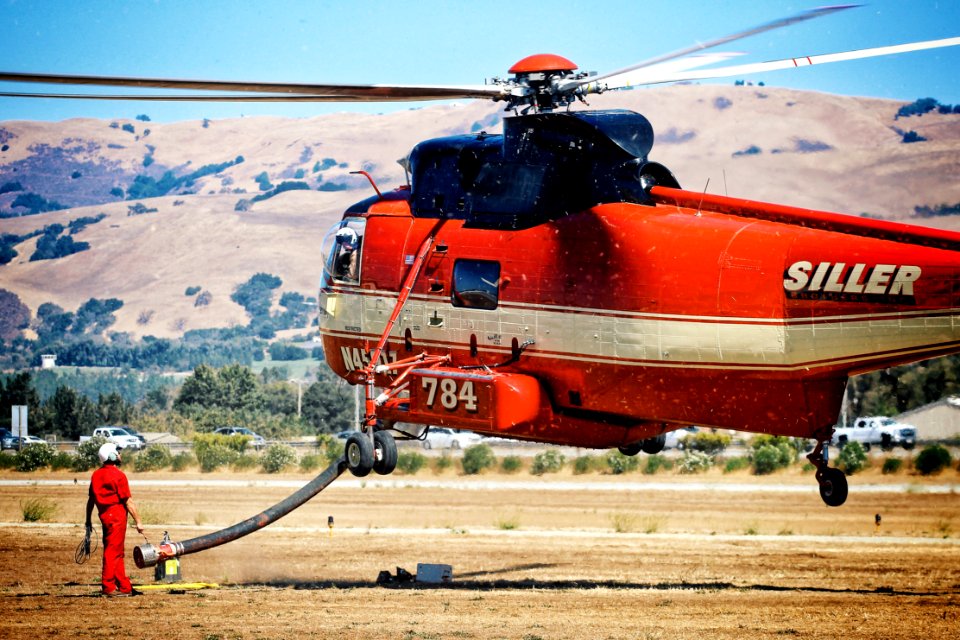 red and white Siller chopper ascending