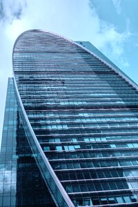 Blue multistory building dark blue sky