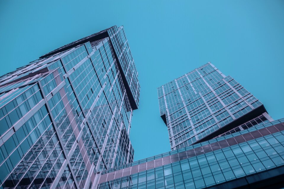 Blue multistory building dark blue sky
