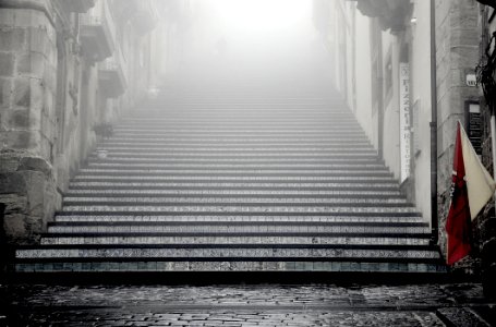 greyscale photography of concrete stairways