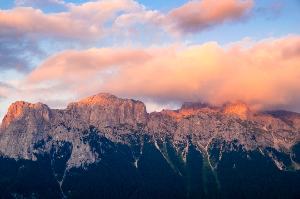 snowed mountain under white clouds photo