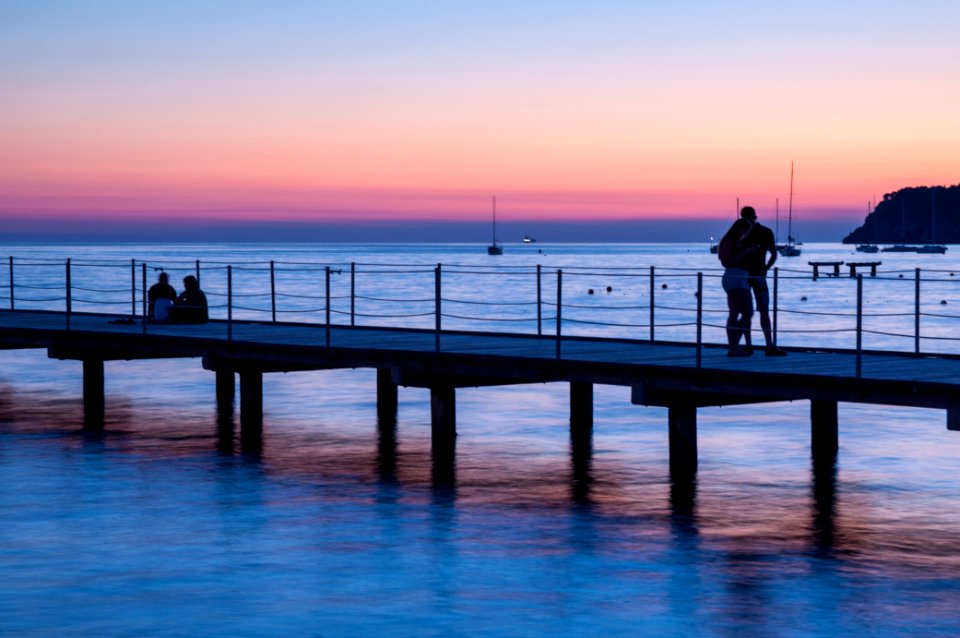 man standing on dock