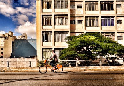 person riding bicycle during daytime photo