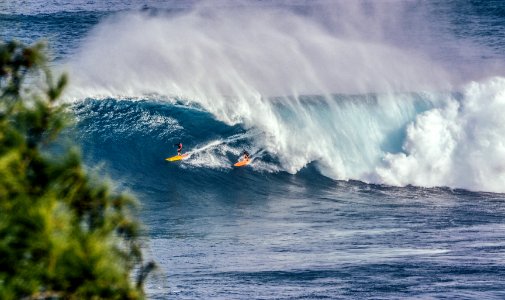 person surfing on wave photo