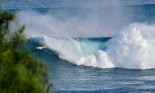 man surfing on clear wave sea photo