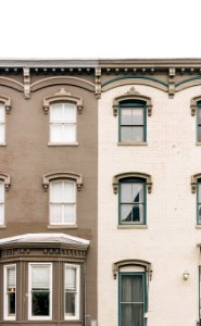 two white and gray concrete buildings photo