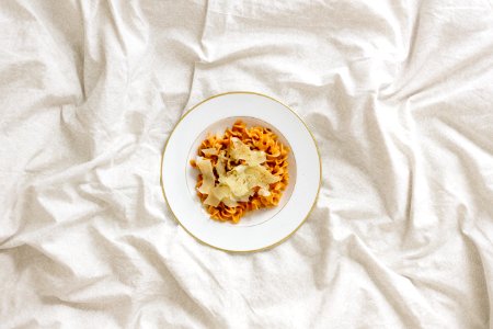 pasta with sauce on plate photo