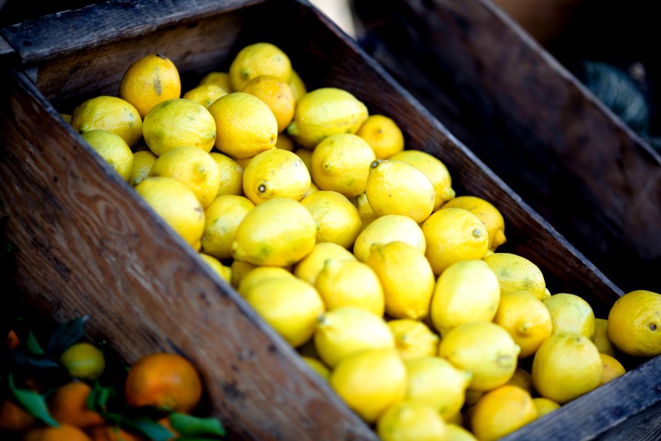 bunch of lemons on box