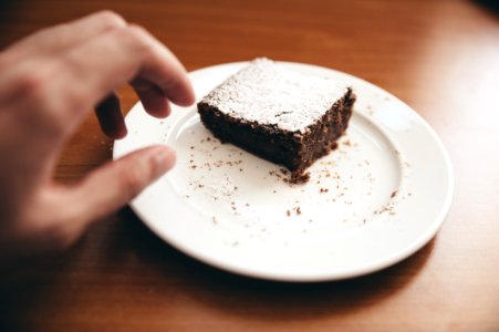 chocolate cake on white ceramic plate photo