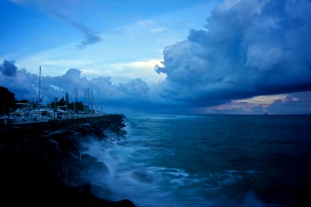 ocean wave under cloudy sky photo