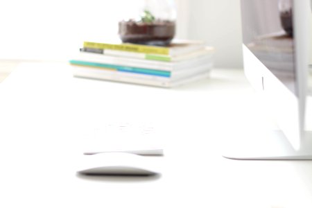 white notebook on white table