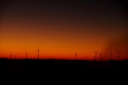 silhouette photography of wind mills photo