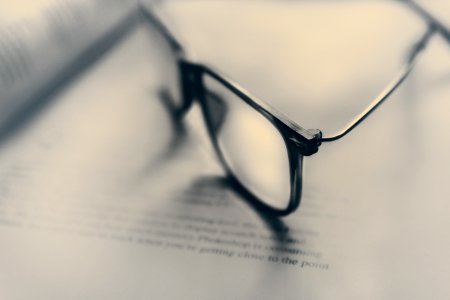 eyeglasses in bokeh photography photo