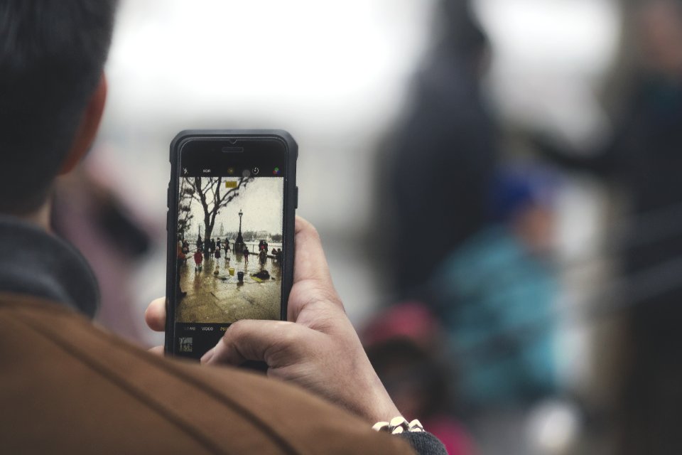 person holding black Android smartphone photo