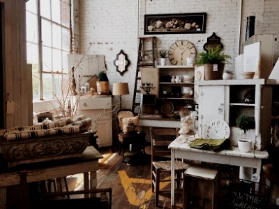 white wooden cabinet near table inside room photo