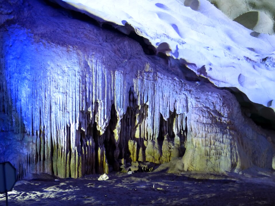Stalagmites lighting grotto