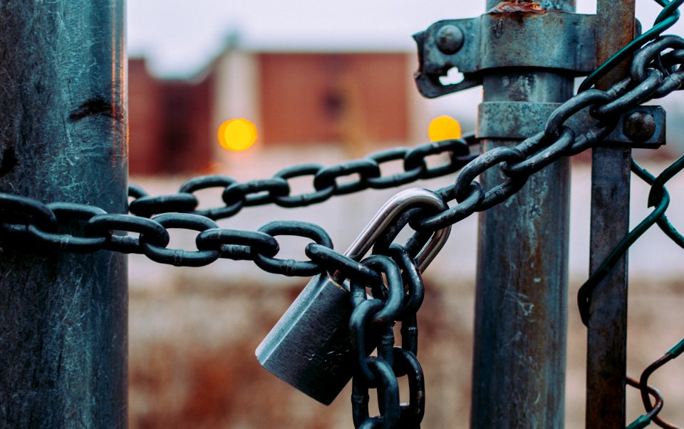macro shot of stainless steel padlock